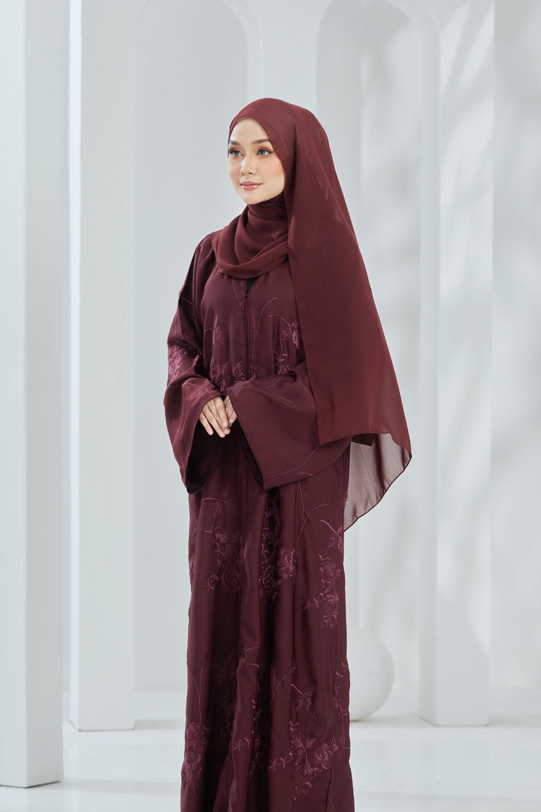 Emilda Abaya in Maroon