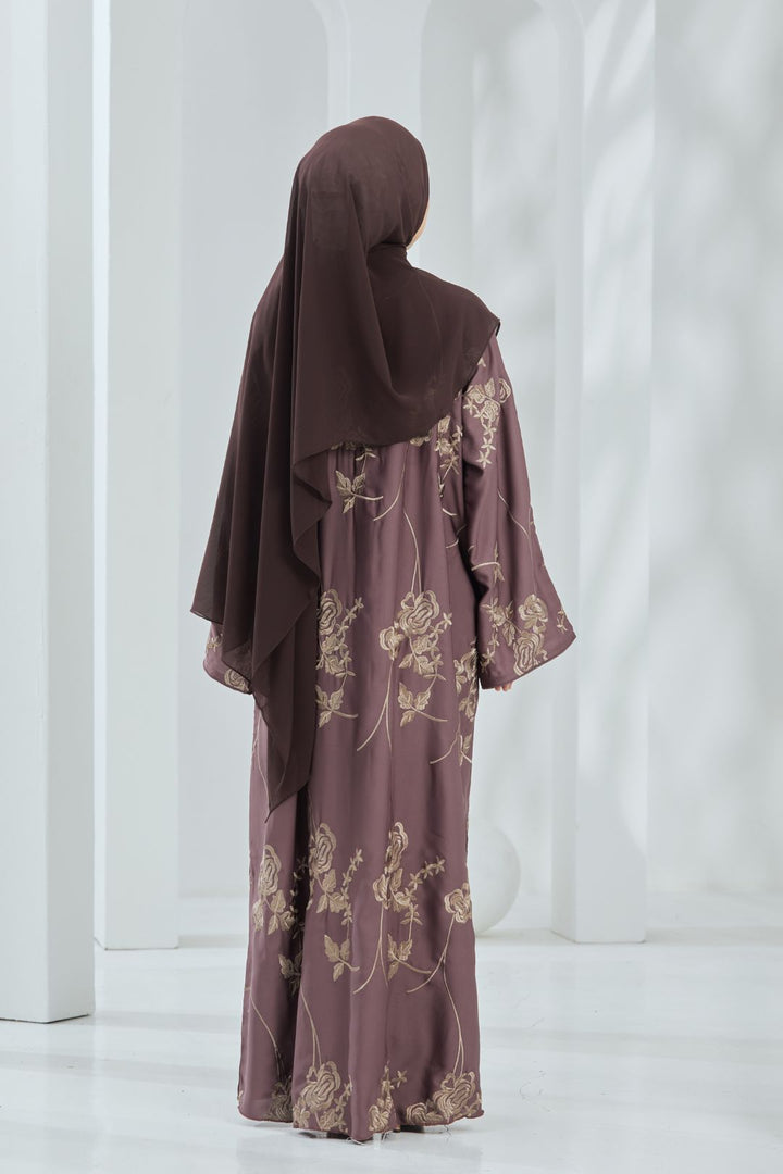 Emilda Abaya in Brown