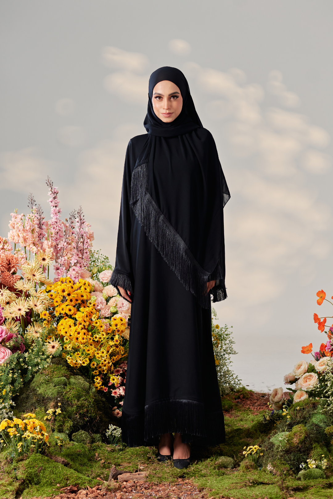 Malaysian model muslimah in nidha abaya with frills on sleeves and hem for Eid 2023