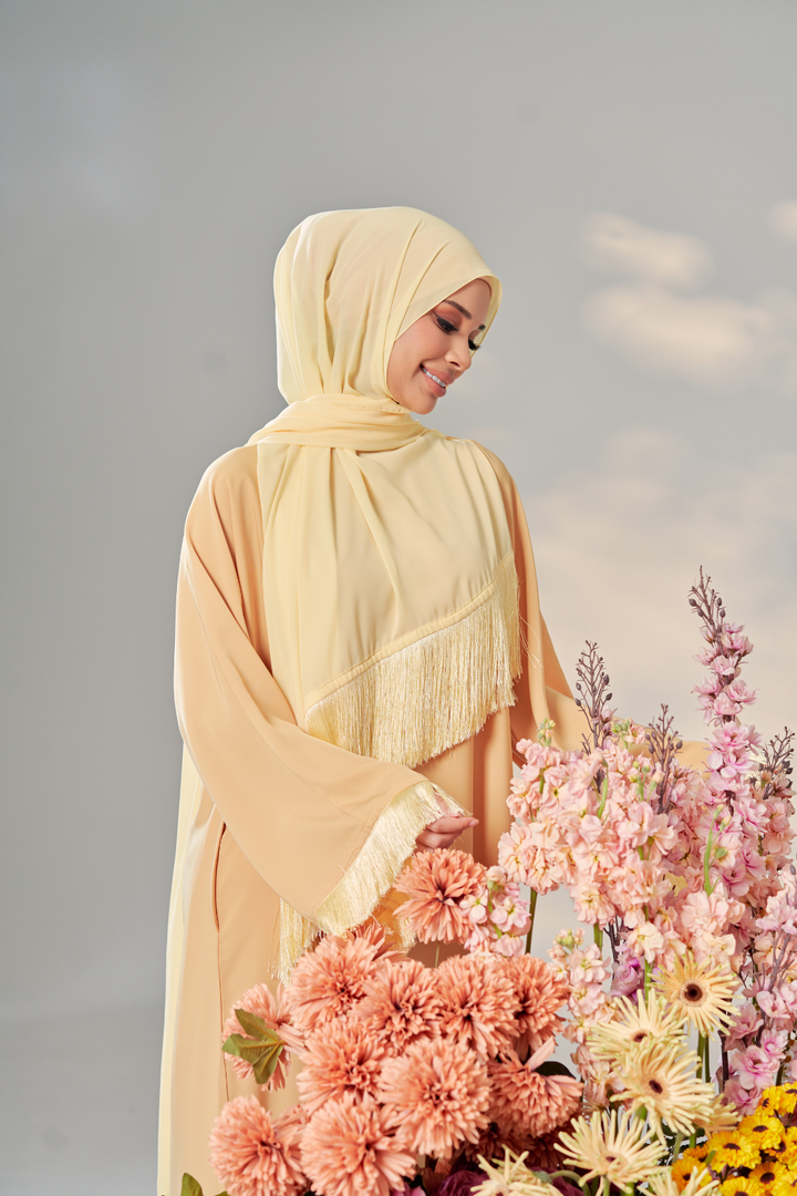 Malaysian model muslimah in nidha abaya with frills on sleeves and hem for Eid 2023